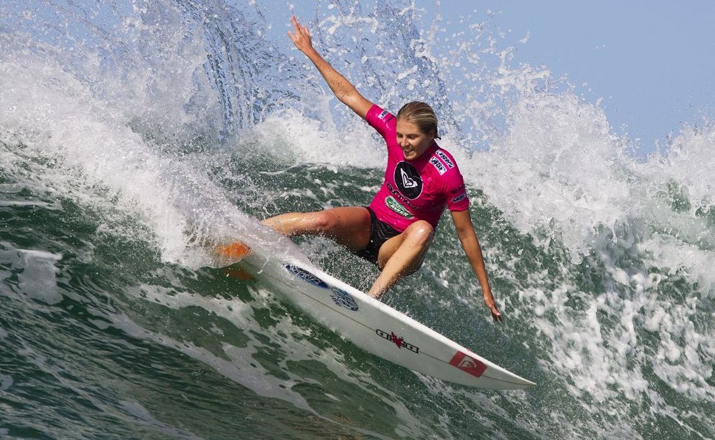 Stephanie Gilmore has a big reason to smile after securing her fifth world surfing title with a win at Roxy Pro Biarritz. Stephanie Gilmore has a big reason to smile after securing her fifth world surfing title with a win at Roxy Pro Biarritz.